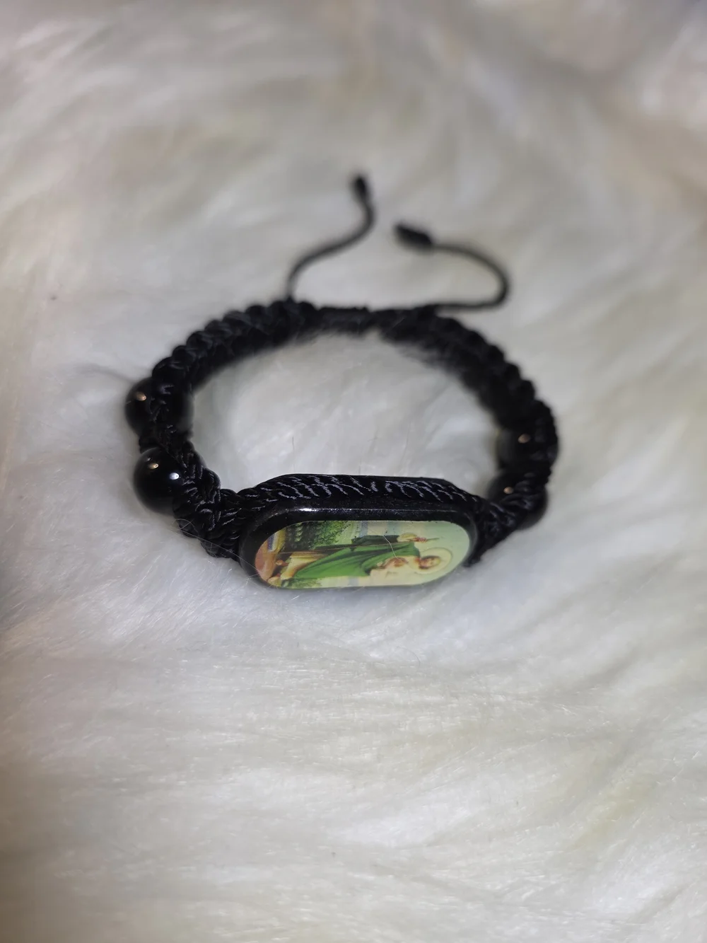 Black Cord Religious Bracelet with Green Saint Image